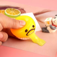 Thumbnail for Squishy Puking Egg Yolk Stress Ball - luvinly